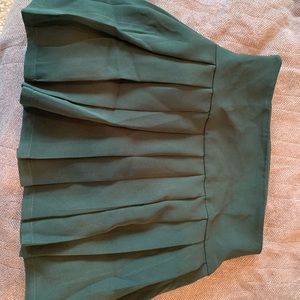 Wide band waist pleated hem skirt